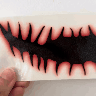 grinmonster-midlertidig-monstermund-tatovering-til-1954-gifsec