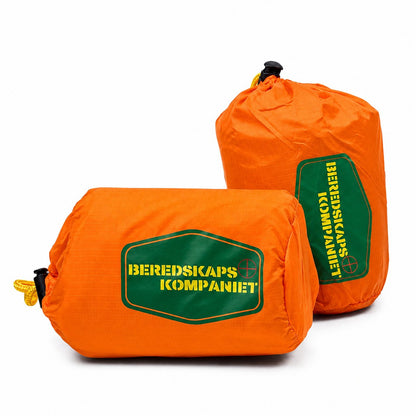 couleur Orange — ThermoBivy™ Nødsovepose – Kompakt Termo-sovepose til Bil, Rygsæk og Beredskabskasse